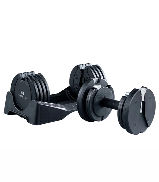 Close-up of 27.5lb black adjustable dumbbell set from T9 series in its cradle