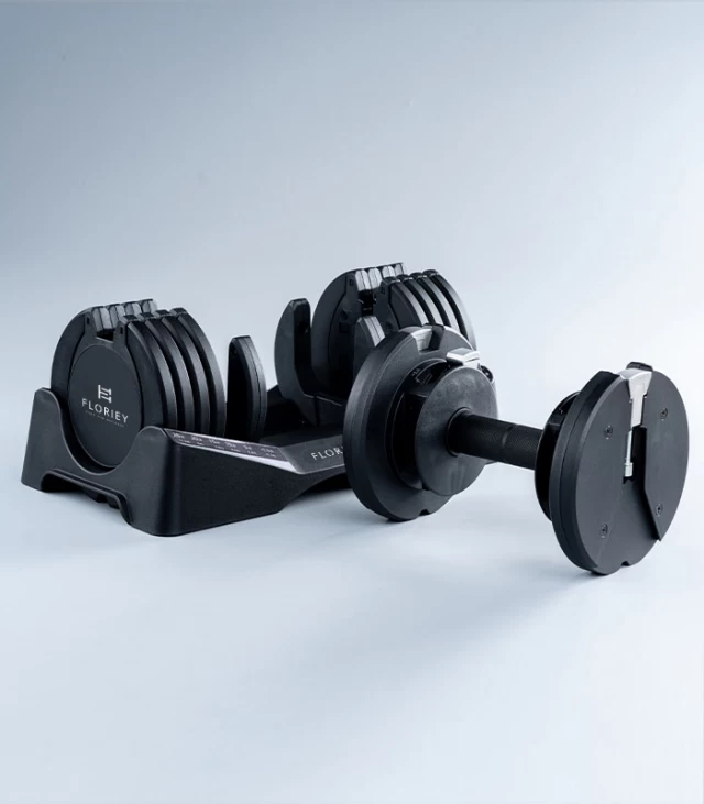 27.5lb black adjustable dumbbell set from T9 series on a reflective surface, ideal for home gym use