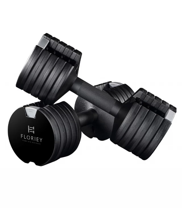 Close-up of a 12.5lb adjustable dumbbell highlighting its compact design