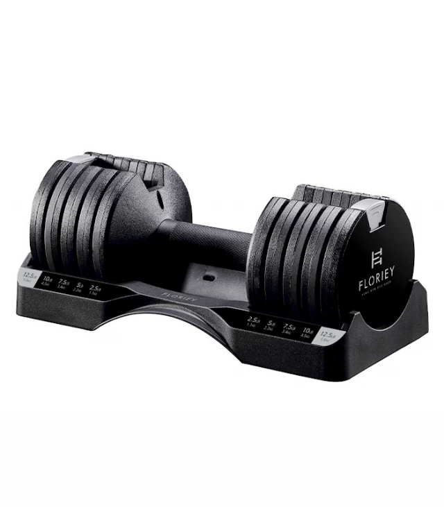 12.5lb adjustable dumbbell set placed in a cradle, ideal for home gym use