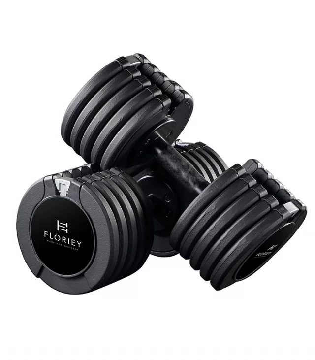 Close-up of 50lb black adjustable dumbbells from T9 series showcasing their sturdy build