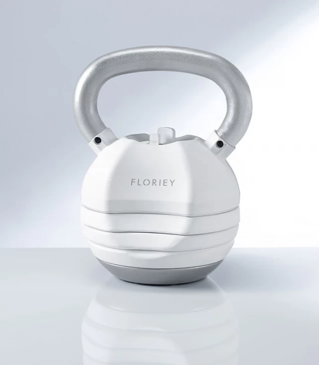 30lb white adjustable kettlebell on a reflective surface by Floriey